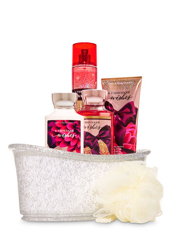 A festive blend of sparkling champagne, crystal peonies & almond creme Gift Set Gift Set